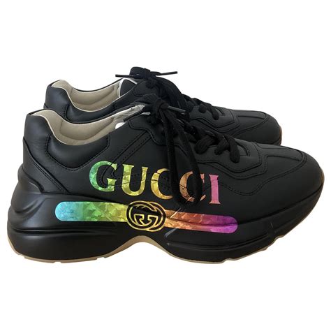 rhyton gucci logo price|gucci rhyton black and white.